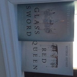 Books  “Glass Sword” and “Red Queen”